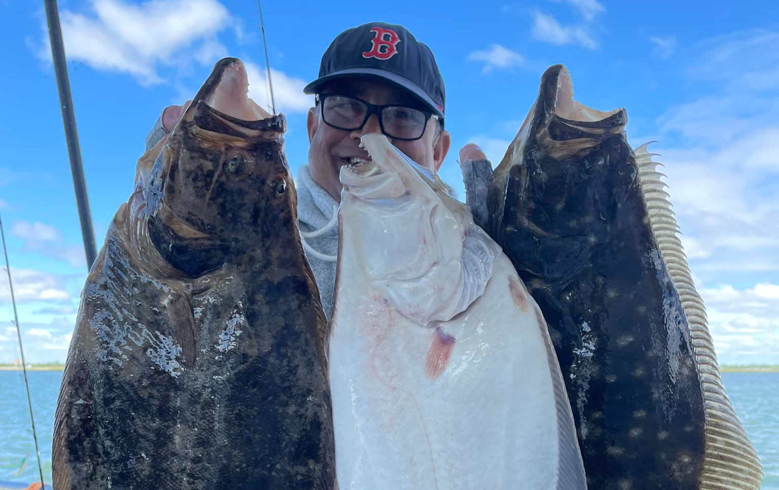 Deep sea fishing Long Island — anglers jigging for blackfish near Point Lookout wrecks